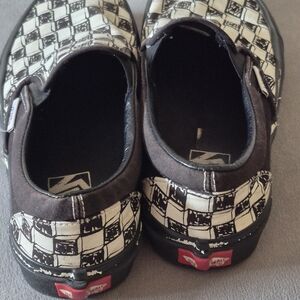 Used Vans black and white slip on checkerboard